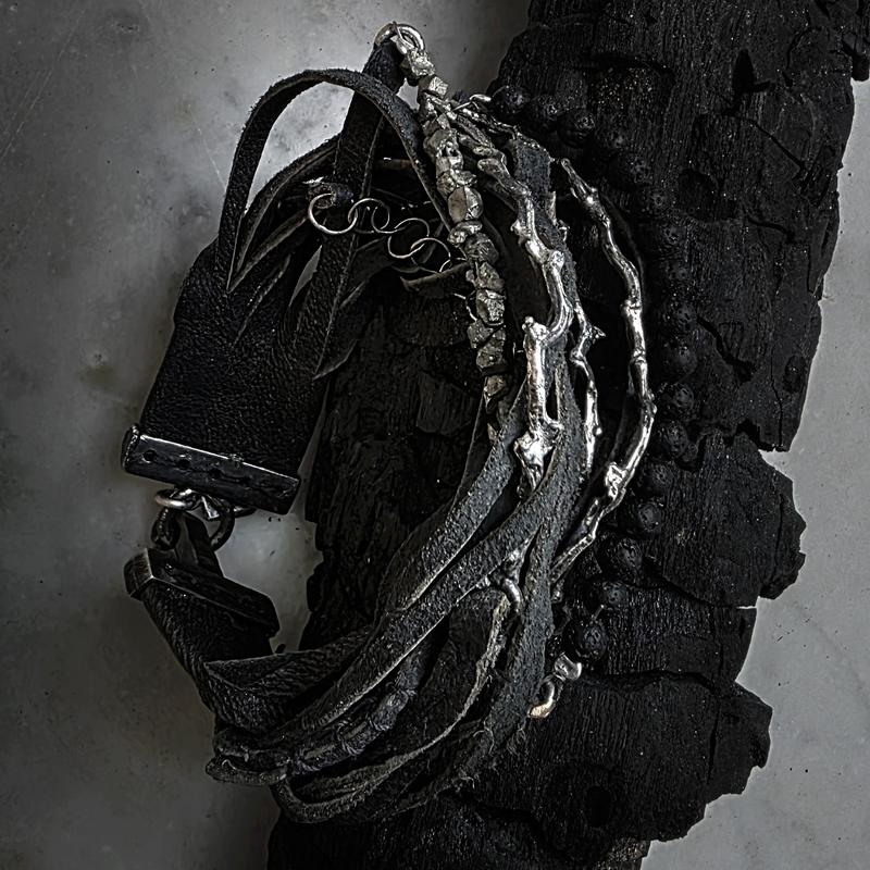 Bracciale, argento e cuoio